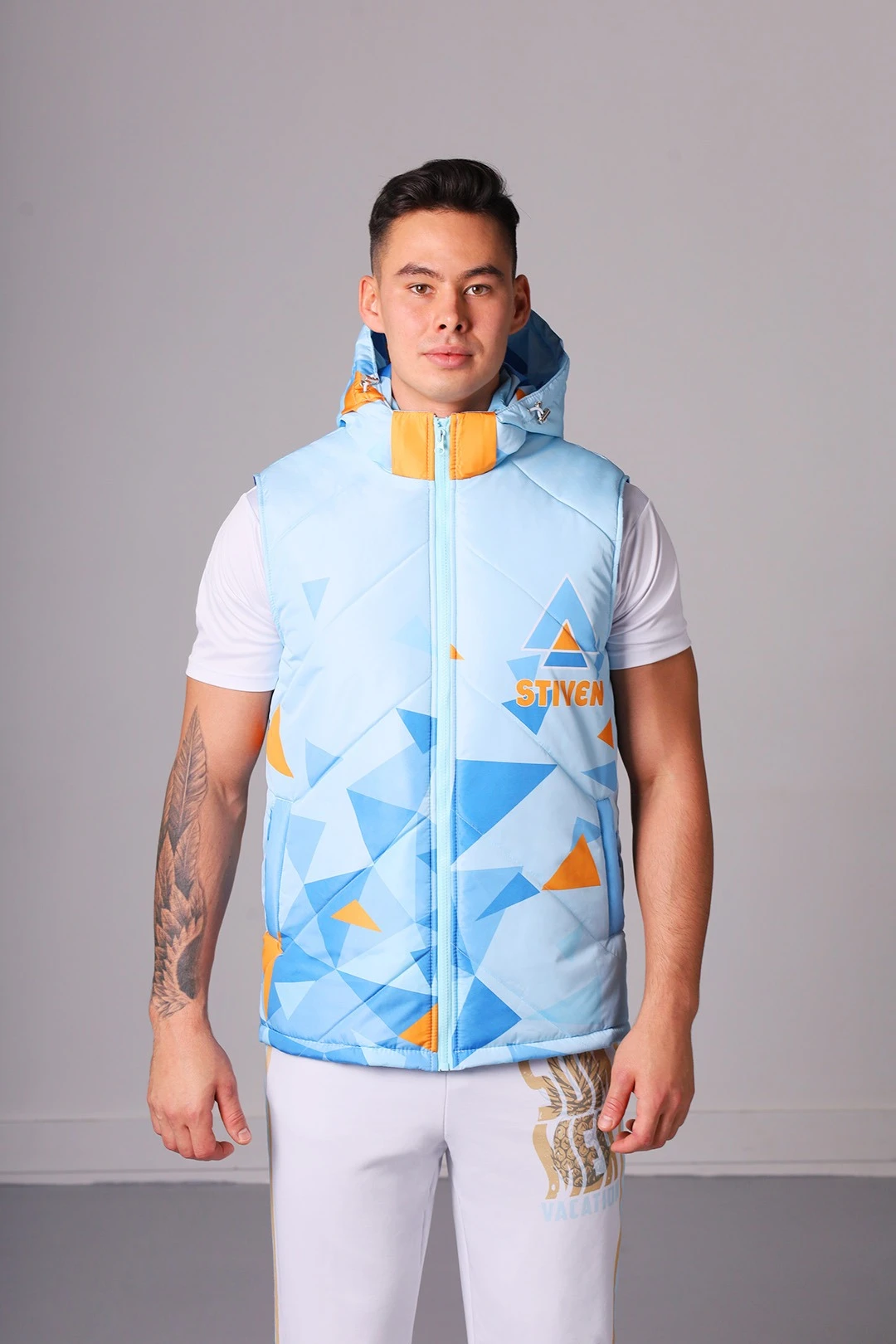 Купить жилет Стивен на синтепоне с капюшоном унисекс, с полной запечаткой "Stiven" Купить жилет Стивен на синтепоне с капюшоном унисекс, с полной запечаткой "Stiven"