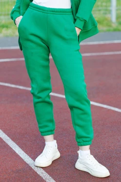 Купить брюки Хит из футера с начесом женские, однотонные зеленые